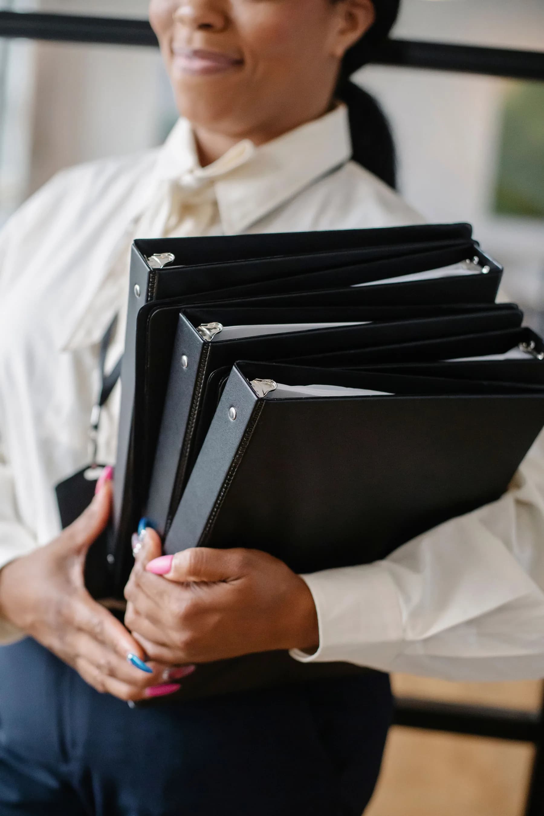A professional carrying organised document binders